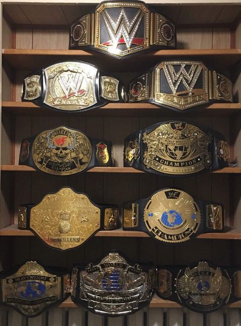 WWE heavyweight championships through the years. Wwe Championship Belts, Wwe Belts, Wrestling Belts, Wrestling Posters, Wrestling Gear, Wwe Pictures, Wwe Tna, Wrestling Stars, Wwe Legends