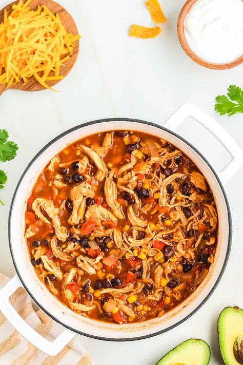 This Easy Red Chicken Chili is made with shredded rotisserie chicken and is such a cinch to pull together! It's cozy, delicious and takes only 30 minutes! It's a heathy meal prep option, too! This is the perfect cozy chicken chili for fall and winter. Creamy Red Chicken Chili, Red Chicken Chili Crockpot, Pulled Chicken Chili, Rotisserie Chicken Chili Real Simple, Shredded Chicken Chili Recipe, Shredded Chicken Chili Crockpot, Rotisserie Chicken Chili Recipes, Chili Recipe Crockpot Chicken, Easy Shredded Chicken Dinner