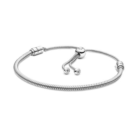 PRICES MAY VARY. Snake Chain Bracelet: Hand-finished in polished sterling silver, it features one movable and one fixed end cap ‚Äî both set with shimmering stones Compatible with PANDORA Moments: PANDORA Moments is a way to say something about who you are through every charm and bracelet you choose and how you choose to wear it Features CZ: Cubic zirconia could be said to be the jewel in PANDORA's crown, making up the majority of stones we use in our jewelry because it optically looks like a di Pandora Chain Bracelet, Royal Chain, Charms Pandora, Slider Bracelet, Bracelet Pandora, Snake Chain Bracelets, White Bracelets, Custom Pendants, Gold Plated Bracelets