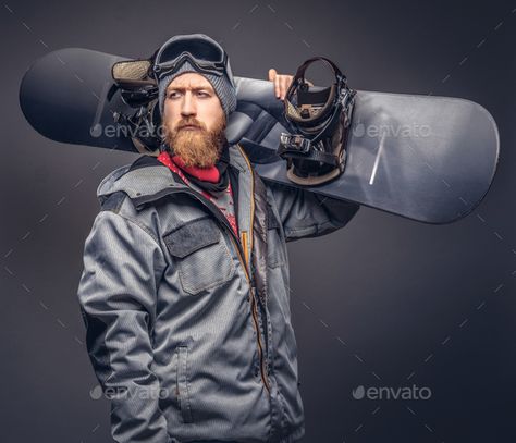 Brutal redhead snowboarder posing with snowboard at a studio. Isolated on the gray background by fxquadro. Brutal redhead snowboarder with a full beard in a winter hat and protective glasses dressed in a snowboarding coat po... #Sponsored #Isolated, #studio, #gray, #fxquadro Ski Portraits, Snowboarding Portrait, Snowboard Photoshoot, Snowboard Trip, Snowboarding Photography, Protective Glasses, Snowboarding Trip, Full Beard, Snowboard Goggles