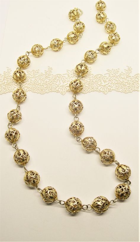 https://www.etsy.com/uk/listing/1526561387/gold-and-silver-filigree-beaded-necklace?click_key=920eb2bea6064056d84705cdb092406128dc3b6c%3A1526561387&click_sum=b48afa49&ref=shop_home_active_1&sts=1 Filigree Jewellery, Filigree Bracelet, Filigree Necklaces, Filigree Jewelry, Silver Chain Style, Enamel Brooch, Sterling Silver Filigree, Cross Jewelry, Beaded Necklaces