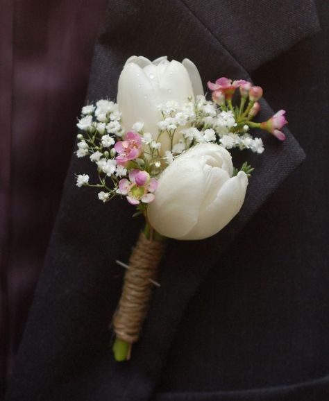 White tulip, wax flower, and baby's breath mother of the bride corsage with twine / http://www.himisspuff.com/white-tulip-wedding-ideas-for-spring-weddings/3/ Wedding Flowers Baby Breath, Flowers Baby Breath, Tulip Theme, Tulip Bouquet Wedding, Mother Of Bride Corsage, Wedding Bridesmaid Flowers, Wedding Flowers Tulips, Tulip Wedding, Corsage And Boutonniere