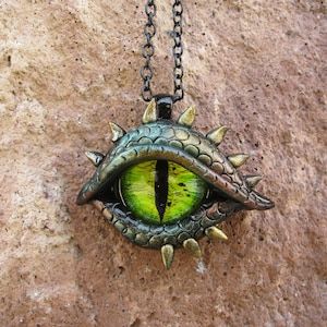 Dragon Eye Necklace Green Dragon Pendant Quirky Gifts for | Etsy Dragon Eye Necklace, Dragon Eye Pendant, Polymer Clay Eyes, Dragon Eye Sculpture, Quirky Gifts For Him, Dragon Eyes, Steampunk Dragon, Arts And Crafts For Adults, Polymer Clay Dragon