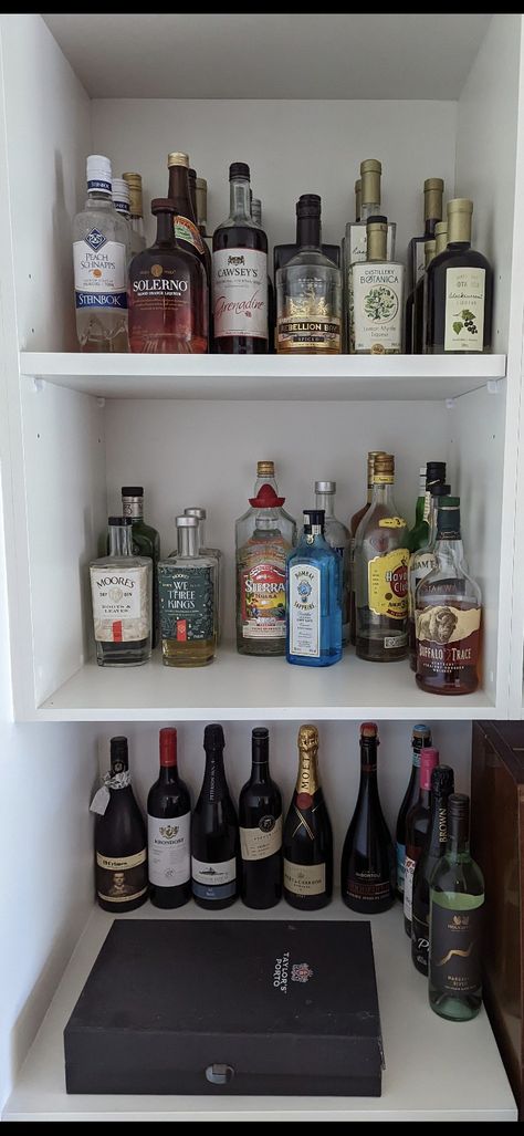 alcohol shelf; we love a gin and tonic, but we also love a glass of red wine Alcohol Shelf Display, Alcohol Shelf Ideas, Alcohol Cupboard, Alcohol Shelf, Alcohol Storage, Glass Of Red Wine, Bar Designs, Home Bar Designs, Peach Schnapps