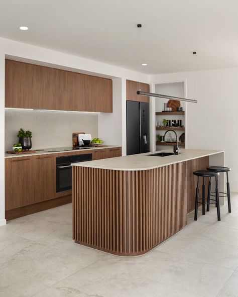 walnut kitchen with curved island in vertical panelling Stone Ambassador, Tv Bookcase, Sanctuary House, Curved Kitchen Island, Curved Kitchen, Coastal Kitchen Design, Contemporary Kitchen Cabinets, Interior Design Programs, Walnut Kitchen