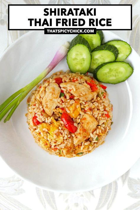 This Shirataki Thai Fried Rice with chicken is quick and easy to make in under 30 minutes and full of all the BEST spicy, savory and sweet flavors that you love in khao pad! It’s the perfect low-calorie meal for busy weeknights and will satisfy your cravings! #friedrice #thaifriedrice #ketofriedrice #lowcaloriefoods #thaicuisine #weightlossrecipes #weightlossmeals #lowcarbmeals #lowcarb #konjacrice #shiratakirice #thairecipes #fakeaway #ketorice | That Spicy Chick Khao Pad, Fried Rice Dishes, Thai Fried Rice, Rice With Chicken, Chicke Recipes, Chicken Fried Rice, Spicy Chili, Fried Rice Recipe, Stir Fries