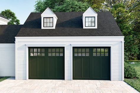 Choosing the perfect garage door style for your home can make the world of difference. We’re certainly feeling green with envy after gazing upon these gorgeous carriage garage doors that suit this home’s exterior splendidly. Garage Door Farmhouse Style, Black Garage Doors Green House, Traditional Garage Door Designs, Traditional Garage Doors, Garage Doors For Colonial Homes, Colonial Garage Doors, Garage Doors Colonial Home, Green Garage Doors, Green Garage Door