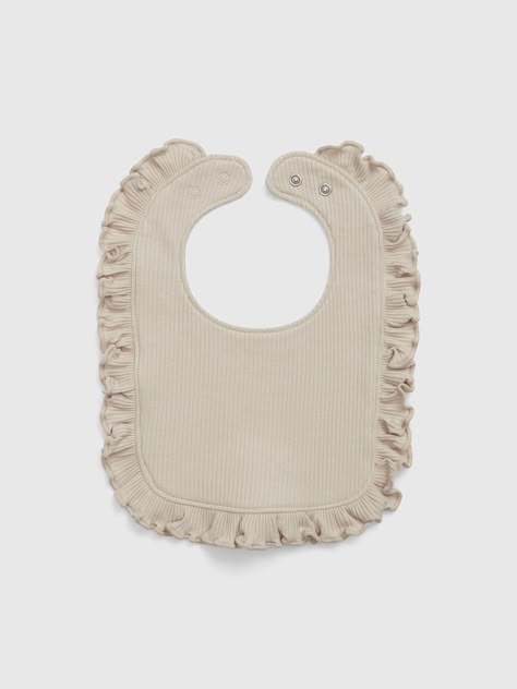 Soft ribbed knit bib.  Snaps at back.  Certain styles have ruffle hem or patch pocket at front. Well Dressed Kids, Baby First Outfit, Baby Ruth, Baby F, Baby Dress Patterns, Baby Necessities, Baby Boutique