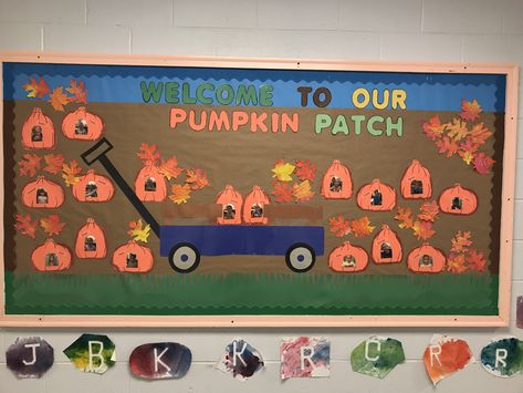 Fall Pumpkin Patch with Pumpkins, Childs Faces, and Wagon Pumpkin Patch Decorating Ideas Classroom, Bulletin Board Ideas Fall Theme, Pumpkin Patch School Decoration, Pumpkin Patch Kindergarten, Halloween Bulletin Boards For Toddlers, Pumpkin Patch Bulletin Board Ideas, Pumpkin Patch Display Ideas, Pumpkin Patch Door Decorations Classroom, Pumpkin Bulletin Board Ideas Preschool