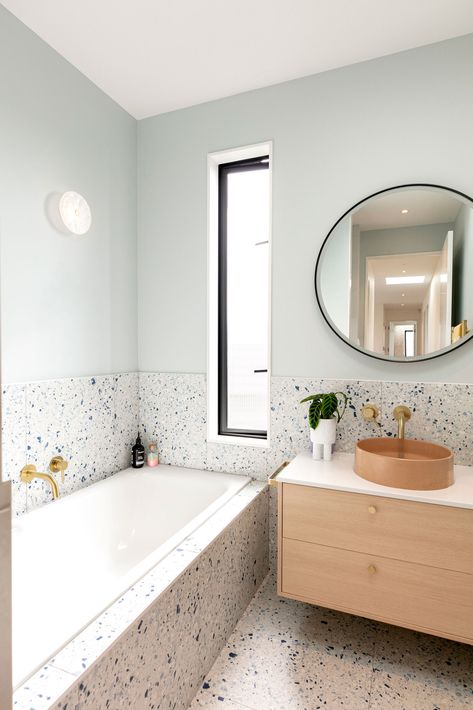 This coastal new build is a colourful dream home Terazzo Bathroom Interior Design, Terrazzo Tile Bathroom, Terrazzo Bathroom Design, Bathroom Terrazzo, Tile Around Bathtub, Terrazzo Bathroom, Blue Terrazzo, Built In Bathtub, Built In Bath