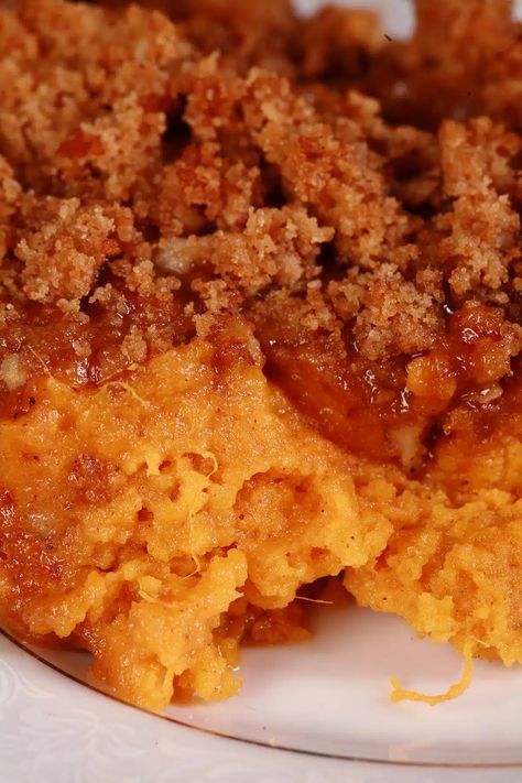 A close up view of a pan of sweet potato souffle. Honey Baked Ham Sweet Potato Souffle, Sweet Potatoes Souffle Recipes, Sweet Potatoes Sufle, Sweet Potato Souffle With Marshmallows, Sweet Potatoes Souffle, Sweet Potato Souffle Recipes Easy, Sweet Potato Suflet, Sweet Potato Souffle Recipes, Sweet Potato Soufflé