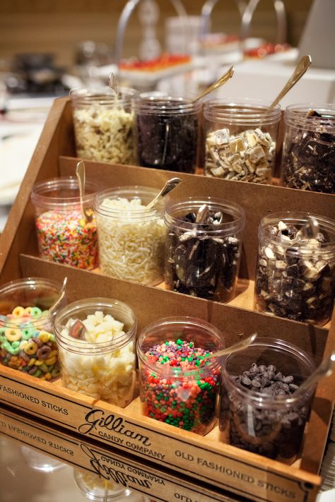 Ice Cream Sundae Bar with All the Fixings Ice Cream Topping Bar Display, Ice Cream Dessert Bar Wedding, Wedding Food Ice Cream Bar, Sunday Ice Cream Bar, Ice Cream Floats Bar, Mini Ice Cream Bar, Self Serve Ice Cream Bar, Wedding Sundae Bar Ideas, Ice Cream Bars Party Ideas