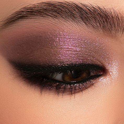 Lose yourself in this wondrous mix of 9 matte eyeshadows, shimmer eyeshadows, metallic eyeshadows and duochrome eyeshadows. A dreamscape of beauty, this travel-friendly eyeshadow palette with purple and mauve shades will let you create flawless looks that mesmerize. HOW TO USE With a fluffy eye brush, softly apply the transition eyeshadow shade of your choice to your crease. Then, with a shader brush, pick up the next shade of your choice and sweep it across the lid. To ensure your look is seaml Day And Night Makeup Looks, Eyeshadow For Wine Colored Dress, Eyeshadow For Burgundy Dress, Purple Eye Makeup For Brown Eyes, Plum Dress Makeup, Purple Shimmer Eye Makeup, Morphe 35xo Palette Looks, Dark Purple Smokey Eye, Subtle Purple Eyeshadow