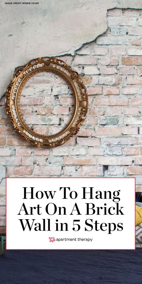 Here's how to hang art on a brick wall in five easy steps. #hangart #hangingart #brickwall #exposedbrick #wallart #walldecor #diy #diyprojects #homedecor How To Decorate Brick Walls, Pictures On Brick Wall, Half Brick Wall, Brick Wall Decor Ideas, Brick Wall Apartment, Hanging Heavy Pictures, Brick Wall Decor, Newport House, Porch Wall Decor