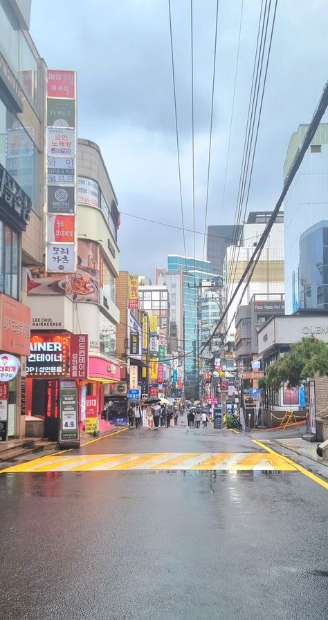 Hongdae on a rainy day🌧 #seoul #hongdae #rain #city #street #aesthetic #wallpaper #korealandscape Korea Rain Aesthetic, Korea Street Wallpaper, Rainy Seoul Aesthetic, Hongdae Street Aesthetic, Korea Streets Wallpaper, Rainy Seoul, Street Aesthetic Wallpaper, City Street Aesthetic, Seoul Hongdae