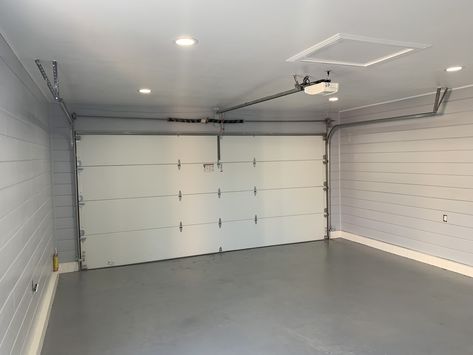 Shiplap garage.   Stained floor Shiplap Wall Garage, Garage Shiplap Wall, Shiplap Garage Interior, Shiplap In Garage, Shiplap Garage, Garage Door Security, Interior Garage Door, Garage Door Trim, Garage Door Panels