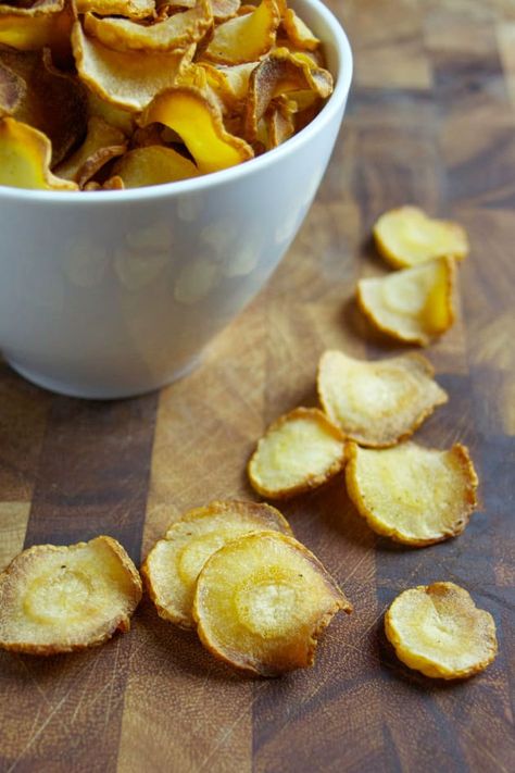 Baked Parsnip Chips take less than an hour. A simple snack for your family or get together. Parsnip Crisps, Parsnip Chips, Parsnip Recipes, Food Wishes, Fun Recipes, Chips Recipe, Paleo Snacks, Parsnips, Fruit Snacks