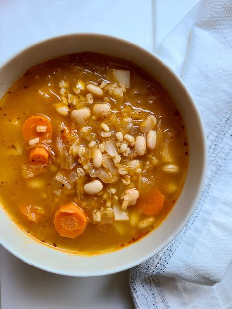 - White Bean, Barley and Sauerkraut Soup Bean And Barley Soup, Adventurous Recipes, Soup With White Beans, Sweet Potato Lentil Soup, Vegan Tortilla Soup, Vegetarian Freezer Meals, Beans Potatoes, Easy Vegan Soup, Vegan Journey