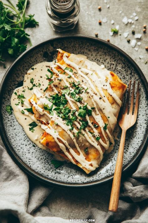 I can't get enough of these creamy enchiladas topped with fresh cilantro and a drizzle of sauce. They are the perfect blend of comfort and flavor, making them a must-try for any taco night! Pair them with a side of your favorite salsa for an extra kick! Creamy Enchiladas, Sweet Potato Enchiladas, Potato Enchiladas, Creamy Enchilada, Vegetarian Enchiladas, Black Bean Chili, Vegan Sweet Potato, Taco Night, Mashed Sweet Potatoes