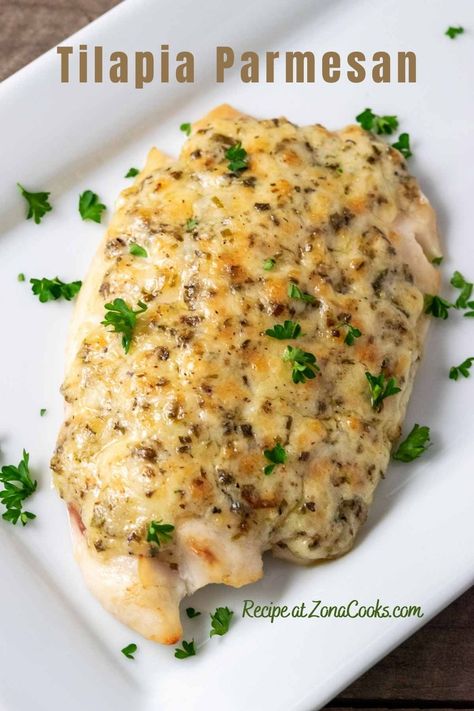 This Tilapia Parmesan for two recipe is so easy and quick to prepare. It is a mild fish and the sauce on top is cheesy, golden brown and savory. This low-carb Parmesan Crusted Tilapia can be baked or broiled and the sauce works great on other white fish like cod. This small batch recipe for two makes a great lunch, dinner, or impressive romantic date night meal. Parmasean Crusted Tilapia Baked, Tilapia Recipes Baked Parmesan Mayo, Parmesan Crusted Fish With Mayo, Broil Tilapia In Oven, Easy Tilapia Recipes Baked Healthy, Tilapia Recipes Parmesan Crusted, Broiled Tilapia Recipes, Parmesan Crusted Tilapia Baked, Baked Tilapia Recipes Oven