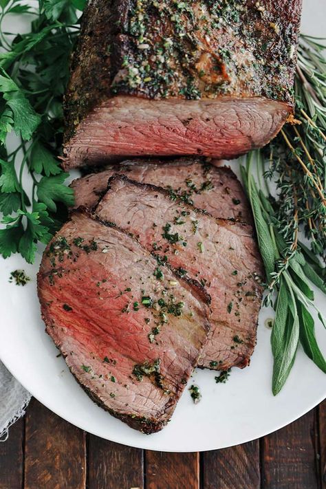 This melt-in-your-mouth Bottom Round Roast Recipe is dry-brined, coated in garlic herb oil, and slow-cooked to tender perfection. Round Roast Recipes, Round Roast Recipe, Bottom Round Roast Recipes, Bottom Round Roast, Parmesan Truffle Fries, Classic Pot Roast, Billy Parisi, Herb Oil, Ribeye Roast