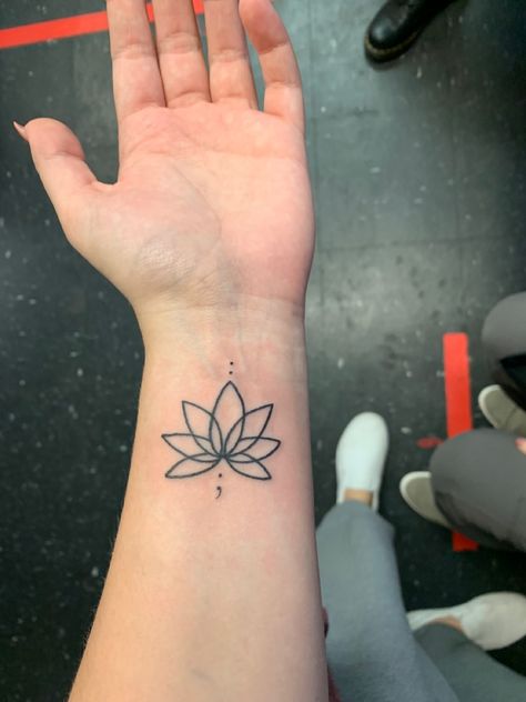 Phoenix Semi-colon Tattoo, Simple Tattoos Semi Colon, Semi-colon Tattoo Dainty, Semi-colon Tattoo Forearm, Lotus And Semicolon Tattoo, Aesthetic Semi Colon Tattoos, Semi-colon Tattoo Black Women, Matching Semi Colon Tattoos, Subtle Semi Colon