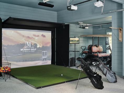 Hidden behind doors, a top-level golf simulator allows you to sharpen your swing from the comfort of home. “Because we’re on a golf course, and this is such a golf community here, it was important for us to make sure that we have some type of simulation happening with the design of the house,” says designer Brian Patrick Flynn. Home Golf Simulator Room, Brian Patrick Flynn, Home Golf Simulator, Simulator Room, Golf Simulator Room, Garage Pictures, Cabin Build, Bluffton South Carolina, Big Boy Bedrooms