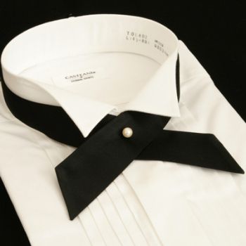 A very elegant alternative to a tie is the continental tie. A continental tie is a very simple piece, consisting of a single strip made from silk or satin, that crosses over at the throat, where it is fasted by a pin or a snap.  See 5 Neckwear Alternatives that are Not Ties http://attireclub.org/2015/10/25/neckwear-alternatives-ties/  #mensfashion #Mensstyle #mensaccessories Alternative Men, Ties For Men, Tie Men, Neck Accessories, Floral Arrangements Wedding, Groom Outfit, Cross Design, Cross Designs, Gentleman Style