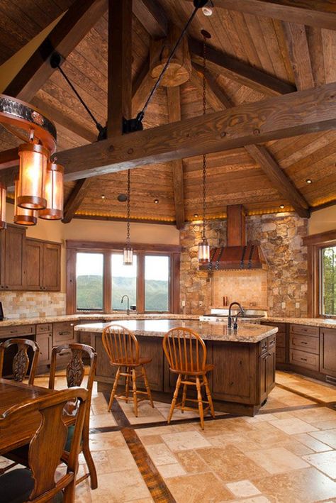 Creating a rustic kitchen in a mountain home creates a comfort and coziness that seems to warm up the brisk air from the surrounding outdoor environment. Post And Beam Lighting Ideas, Circular Kitchen, Rustic Cabin Kitchen, Log Cabin Kitchens, Dapur Rustic, Log Home Kitchens, Octagon House, Eclectic Kitchen, Rustic Kitchen Design