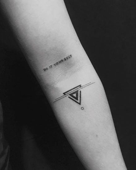 Geometric Tattoo Ideas | Brit + Co Stammestattoo Designs, Small Geometric Tattoo, Geometric Tattoo Pattern, Tattoo Band, Shape Tattoo, Muster Tattoos, Geometric Tattoos, Cat Tattoos, Inspiration Tattoos