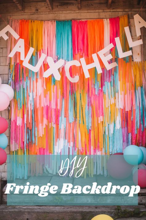 The text reads DIY Fringe Backdrop. The photo behind the text is a big backdrop made of many different colour strands. A Fauxchella banner also hangs at the top of the backdrop. Streamers Photo Backdrop, Mylar Backdrop Diy, Diy Tissue Paper Backdrop, Diy Plastic Table Cloth Photo Background, Backdrop Made From Plastic Tablecloths, Tassle Backdrop Photo Booths, Inexpensive Photo Backdrop, Plastic Tablecloth Fringe Backdrop Diy, Fringe Background Diy