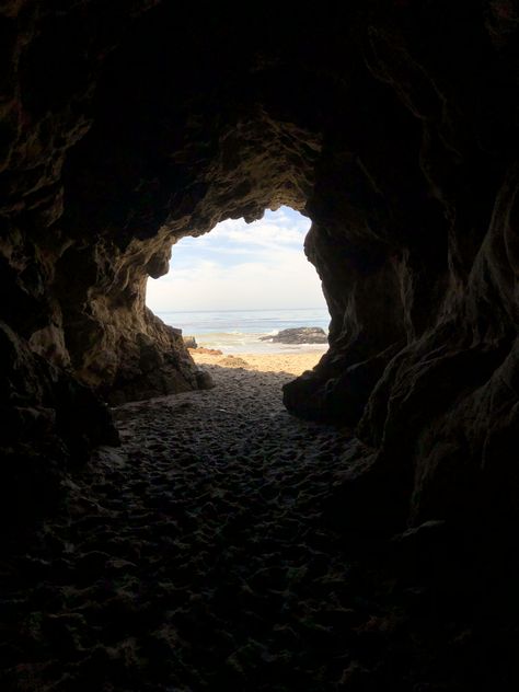 a sea cave in malibu california Beach Cave Aesthetic, Sea Cave Aesthetic, Slayology Hair, Stuck On A Deserted Island Aesthetic, Honeysuckle Aesthetic, Deserted Island Aesthetic, Pirate Aesthetics, Cave Aesthetic, Rock Guys