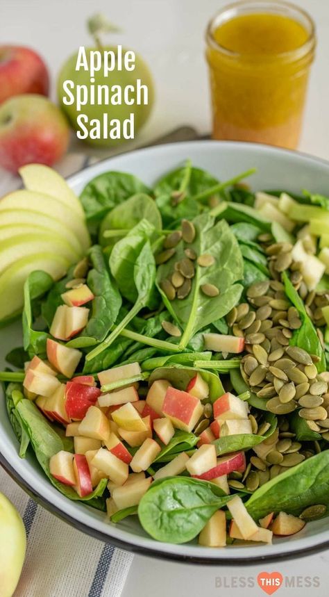 Quick and easy Apple Spinach Salad recipe with apples, pumpkin seeds, and a simple flavor-filled apple vinaigrette dressing to go with it. #spinachsalad #healthy #apple #raw #vegan #blessthismessplease Apple Vinaigrette Dressing, Apple Spinach Salad, Spinach Apple Salad, Apple Vinaigrette, Recipe With Apple, Recipe With Apples, Pumpkin Seed Salad, Simple Spinach Salad, Apple Salad Recipes