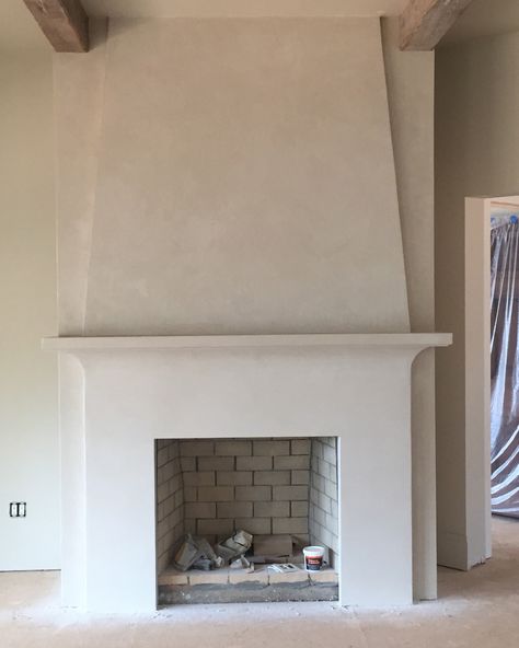 Marmarino plaster on fireplace 2 Storey Fireplace Ideas, Sloped Fireplace, Spanish Style Plaster Fireplace, Plaster On Fireplace, Plaster And Tile Fireplace, Smooth Plaster Fireplace, Smooth Stucco Fireplace, Plastered Fireplace Ideas, Plaster Fireplace Mantle