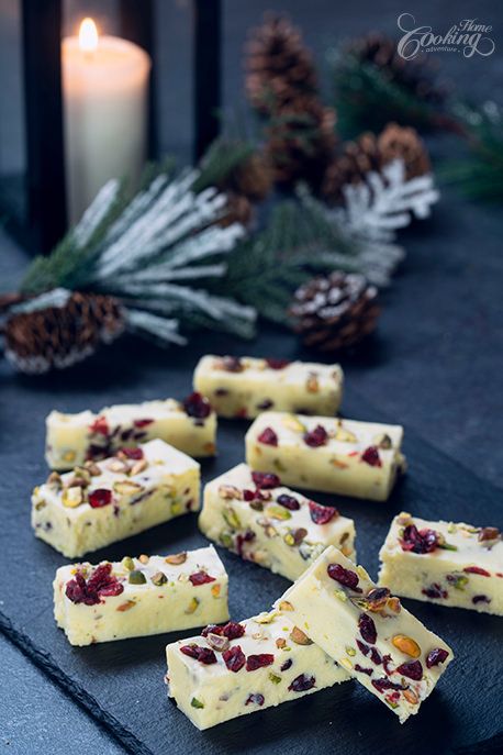 I've been making this Cranberry Pistachio Fudge for years, usually for Christmas and New Year's Eve and every time I make it everybody is super excited about it and it is usually devoured in a matter of minutes. Once you try it you can hardly stop at only one piece as it is simply irresistible and quite addictive. This recipe of fudge that uses powdered milk is by far one of my favorite fudge recipes, as you can have better control on the sugar and the results are always amazing. Cranberry Pistachio Fudge, Pistachio Fudge, Cranberry Fudge, Cranberry Orange Cookies, Cranberry Dessert, Raw Pistachios, Peanut Butter Fudge Easy, White Chocolate Fudge, Christmas Fudge