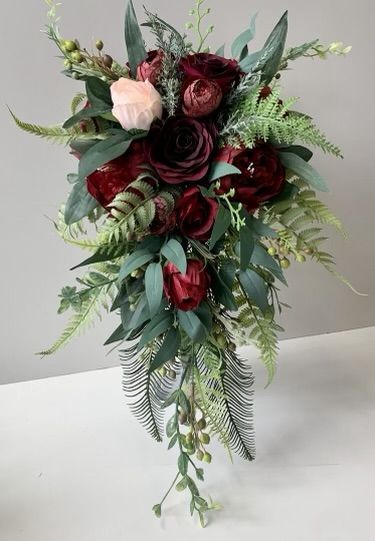 Cascading Red Rose Bouquet, Burgundy Cascading Bouquet, Burgundy Bridal Bouquet Cascade, Crimson Wedding Flowers, Burgundy Bride Bouquet, October Bridal Bouquet, Bride Bouquets Burgundy, Burgundy Floral Arrangements, Burgundy Flower Bouquet