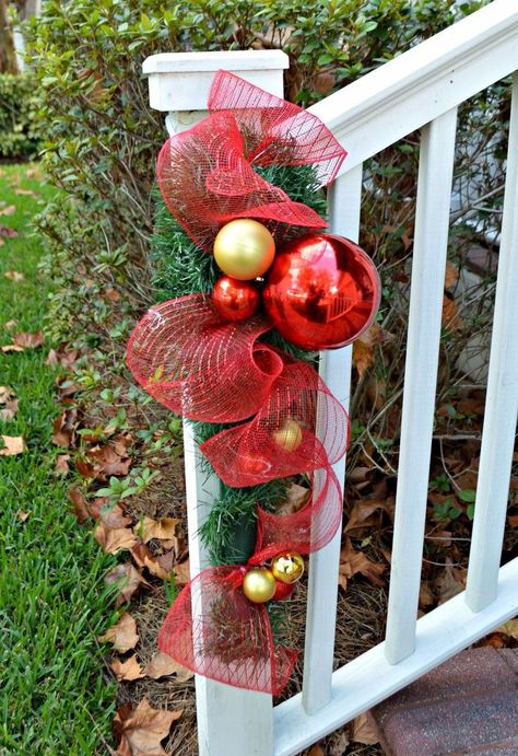 “I love this idea I'm going to Dollar Tree NOW!” said a reader when she saw this Christmas porch idea! Diy Christmas Decorations Dollar Store, Dollar Store Diy Christmas, Ideas Decoracion Navidad, Dollar Store Christmas Decor, Dollar Store Christmas Decorations, Dollar Store Christmas, Christmas Porch Decor, Christmas Swags, Diy Dollar Store Crafts