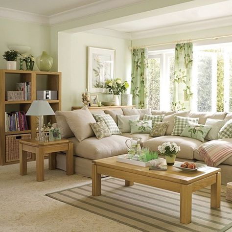 Look at this pastel green inspired living room. The color combination makes the room look airy and bright. It only has simple furnishings but it strikes you as a very pretty home all because of a well balanced color planning. Brown Living Room Decor, Small Family Room, Cozy Family Rooms, Trendy Living Rooms, Brown Living Room, Living Room Green, Family Room Design, Design Living Room, Living Room Colors