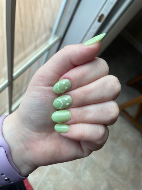 light green, almost a melon color, SNS dip nails in an oval shape. happy/sad face designr on pointer and middle finger Middle Finger Nail Design, Sns Dip Nails, Smiley Nails, Concert Nails, Dip Nail, Sns Nails, Dip Nails, Crazy Makeup, Pretty Nail Art