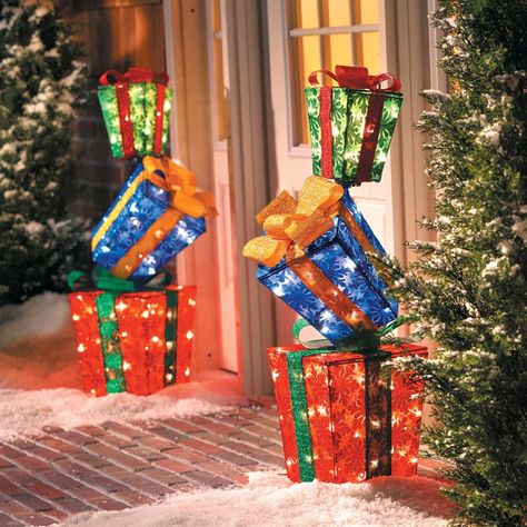 Nothing says "happy holidays" like precariously stacked gift boxes. Greet family and friends as they enter your home with this festive outdoor Christmas decoration. Stacked Gift Boxes, Outdoor Christmas Presents, Large Outdoor Christmas Decorations, Christmas Present Decoration, Papercraft Mask, Christmas Lawn Decorations, Gift Boxes Decoration, Outside Christmas Decorations, Cardboard Frame