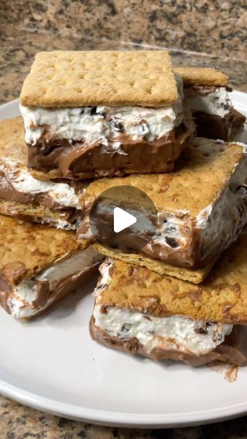 Carman Wilken on Instagram: "These Frozen S’mores Bars are a perfect summertime treat! Recipe at the end of the video 😋 #smores #frozensmores #summer #dessert #treat #icecream #4thofjuly #easyrecipe" Frozen Smores Sandwiches, Smore Ice Cream Cake, Frozen Smores Recipe, Frozen Smores Bars, Smores Dessert Bar, Cream Deserts, Carman Wilken, Frozen Smores, Smores Ice Cream