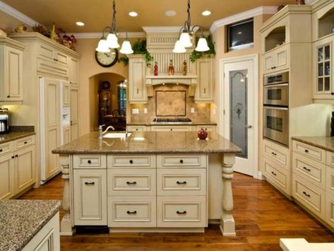 15 White Antique Kitchen Designs That Abound With Warmth & Charm Cream Colored Kitchen Cabinets, French Country Kitchen Cabinets, Classic Kitchen Cabinets, French Country Kitchen Designs, Antique White Kitchen Cabinets, Antique Kitchen Cabinets, Cream Kitchen Cabinets, Antique White Cabinets, Antique White Kitchen