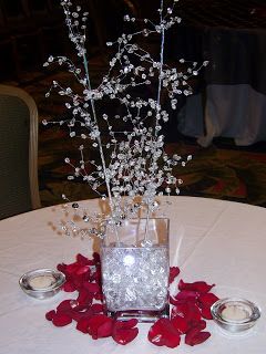 Smaller crystal centerpiece with red rose petals          pics of our beaded centerpieces               Crystal Ballroom Marriott World Cen... Diamonds Are Forever Prom Theme, Diamonds Are Forever Theme Party, Casino Centerpieces, 60th Anniversary Parties, Diamond Theme, Delicate Silver Rings, 15th Wedding Anniversary, Diamond Centerpiece, Prom Themes