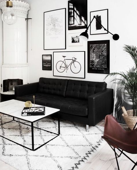 Black tufted sofa in modern contemporary living room with white marble table and gallery wall Black Sofa Living Room, White Living Room Decor, Black And White Living Room, Living Room Scandinavian, White Living, White Living Room, Living Room White, Minimalism Interior, Decoration Inspiration