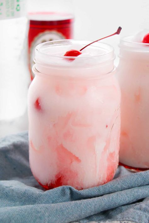 This Shirley Temple dirty soda recipe is a fun and tasty twist on a classic dirty soda. The sweet, fizzy, and creamy drink is easy to make with 3 ingredients and has lots of flavor. It's the perfect pick-me-up on a hot summer day. Mormon Soda Recipes, Dirty Soda Bar Drink Stations, Dirty Soda Recipes, Book Truck, Flavored Ice Cubes, Coconut Creamer, French Vanilla Creamer, Vanilla Coffee Creamer, Flavored Coffee Creamer