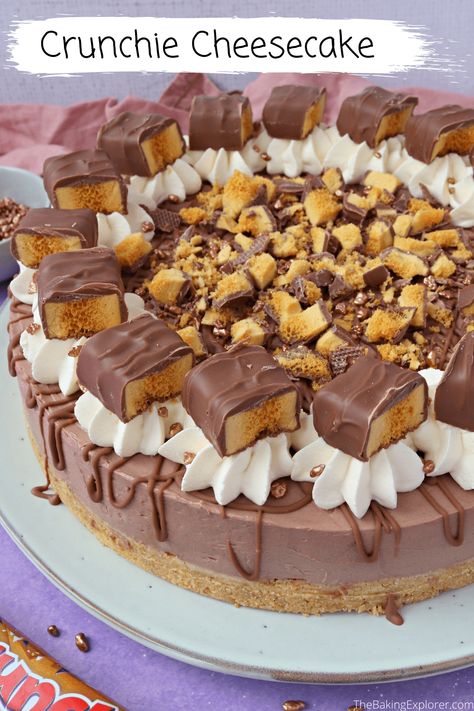 Recipe for a No Bake Crunchie Cheesecake - a buttery biscuit base, chocolate cheesecake with crunchie honeycomb pieces, drizzled in milk chocolate, whipped cream and lots of Cadbury's Crunchie bar! A yummy honeycomb and chocolate no bake dessert! #thebakingexplorer #cheesecake #honeycomb #cadburycrunchie Crunchie Cheesecake, Crunchie Recipes, Cadbury Crunchie, Crunchie Bar, Cheesecake No Bake, Orange Cupcakes, Buttery Biscuits, Digestive Biscuits, It's My Birthday