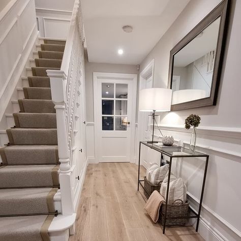 Hallway with light painted panelling and oak flooring. Black And White Entryway, Long Narrow Hallway Ideas, Painted Panelling, Entryway Designs, New England Style Homes, White Entryway, Victorian Hallway, 1960s House, Narrow Hallway Ideas