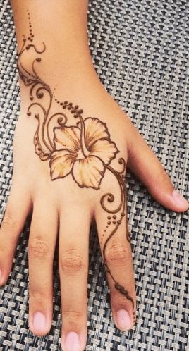 Hawaiian Flower Tattoo, Tattoos On Hand, Hawaiian Flower Tattoos, Hawaiian Tattoos, Bracelet Tattoos, Wrist Bracelet Tattoo, Pretty Flower Tattoos, Favorite Tattoos, Henna Inspired Tattoos