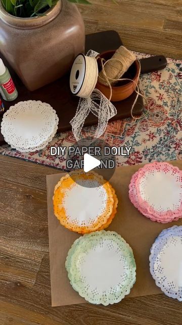 Amanda Hernandez on Instagram: "Easy DIY garland. Perfect for parties and hosting ✨  This paper lace doily garland is so easy to make and I love that you can switch up the paint colors and ribbon to match the aesthetic of your party.  This would also be a fun craft for kiddos too!   Supplies needed:   Paper doilies  Acrylic paint  Twine  Ribbon   Add a little water to your bowls and then your paint - you want more paint than water ratio. You can adjust this part to your liking though.   I hung my twine and then placed my doilies on it.   ***If this will be used outside then I would recommend adding a dot of hot glue under each doily on the twine to secure it.   I loved how this turned out. Such a fun and festive touch to parties 💃🏻   save and share with your craft girlies 🫶🏻   Follow @ Doily Bunting Diy, Doily Garland, Doily Bunting, Paper Doily Crafts, Paper Lace Doilies, Bunting Diy, Doilies Crafts, Tafel Decor, Lace Doily