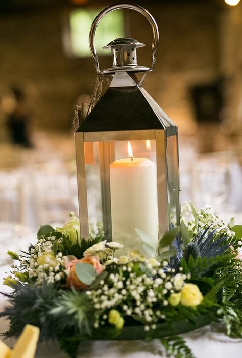 Wedding centre piece lantern with David Austen roses, thistles and eucalyptus Centre Pieces Wedding Lanterns, Scottish Wedding Centerpieces, Lantern Eucalyptus Centerpiece, Thistle Centre Pieces Wedding, Rose And Thistle Buttonhole, March Wedding, Commitment Ceremony, Eucalyptus Wreath, Wedding Breakfast